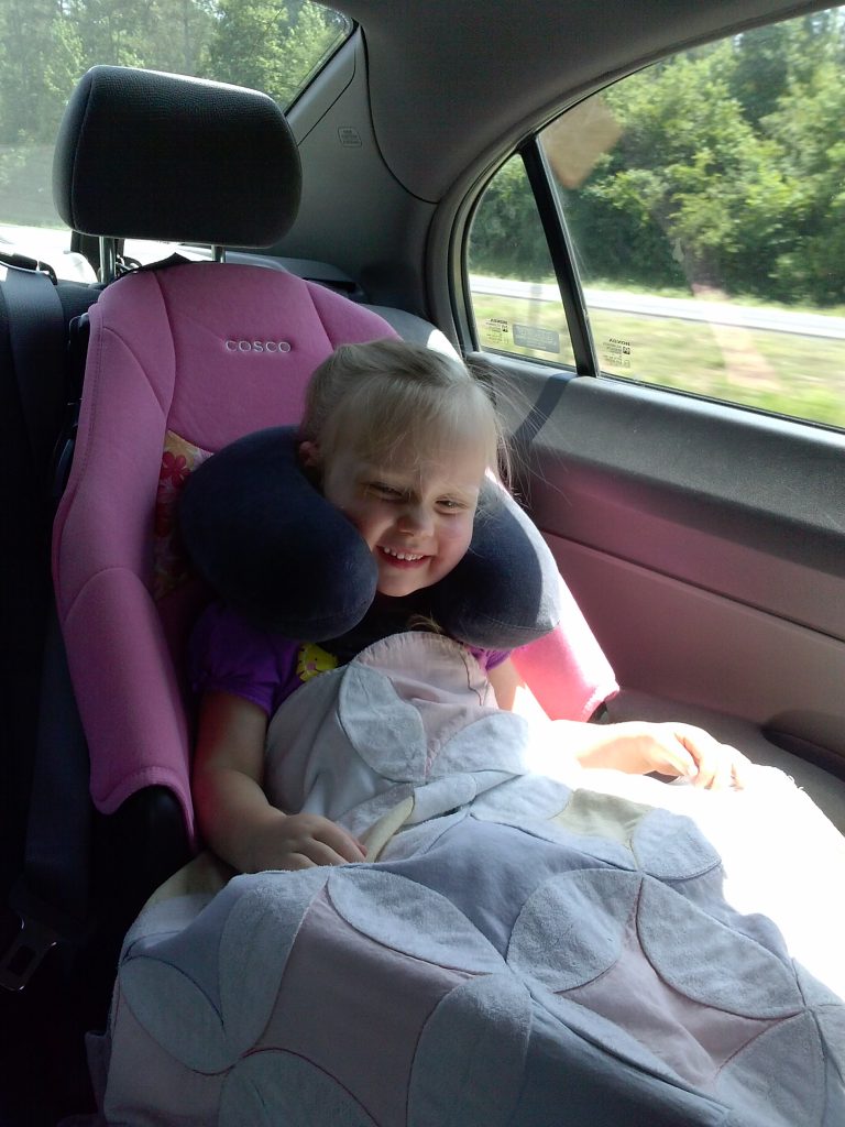 Fay wanted to see if the travel pillow would help her sleep in the car. :)