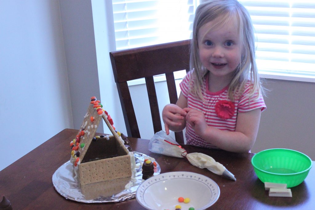We made gingerbread houses! They were nothing like the St. Peter's Basilica that Josh made a few years ago; but we all had fun! Fay decorated hers all by herself! Carter mostly just loved how much candy was being opened!
