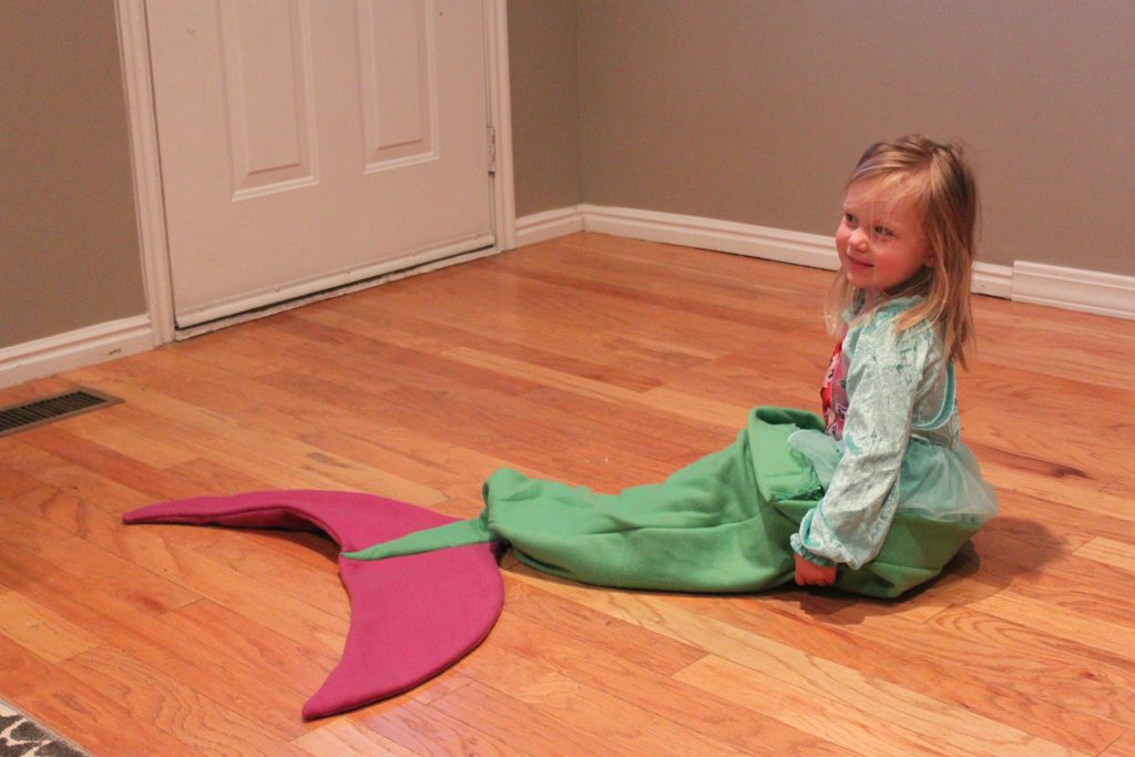 I made this mermaid tail for Fay. The cutest thing ever is when she has somebody hold her so that she can kick like a mermaid!