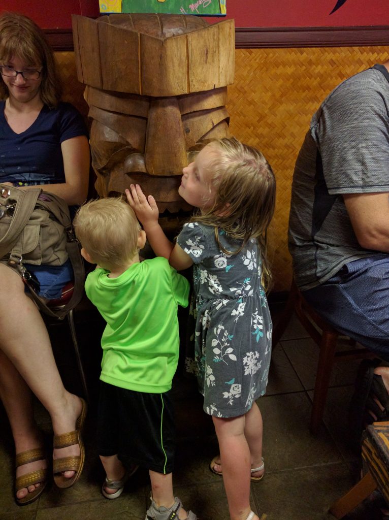 Fay and Carter hugging a tiki man at "Tiki Tacos." You can see some more family in the background. I'm embarrassed at how many pictures I DON'T have of the group altogether.
