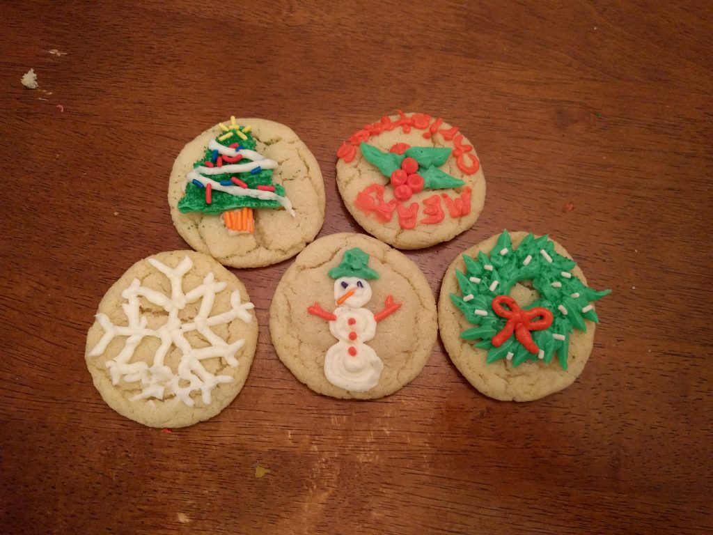 The other parent-decorated cookies. Mine are the bottom 3 and I'm rather proud of them. I accidentally brushed my hand through the snowflake right before the picture. 